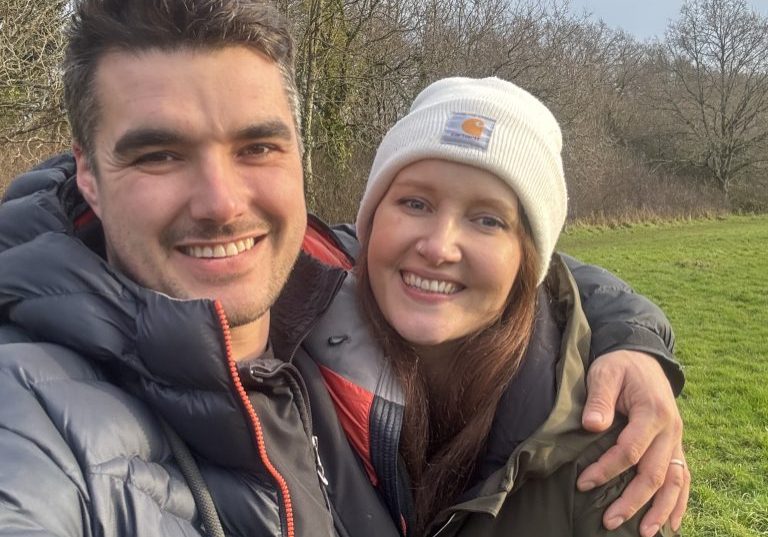 Chris Hull and Zoe Hull of greenbook landscapes standing in a park in exeter